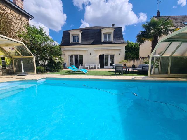 Maison 7 pièces 292 m²