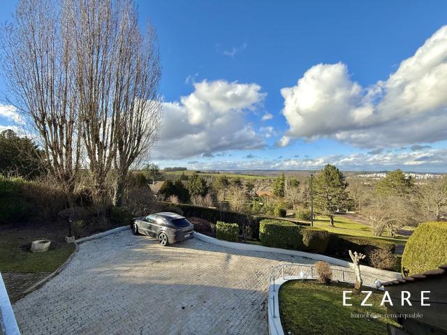 Maison 7 pièces 216 m²