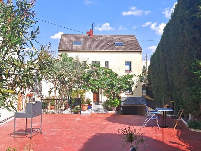 MAISON 7 PIECES AVEC JARDIN