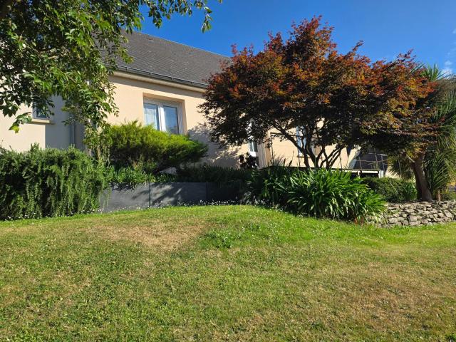 Maison 4 chambres avec garage et jardin
