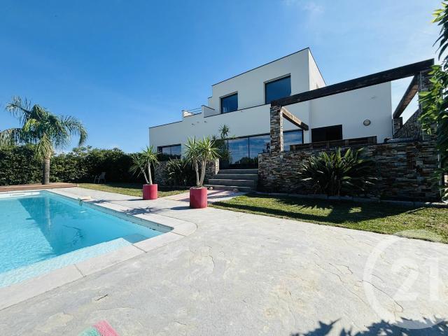 Maison 4 pièces 210 m²