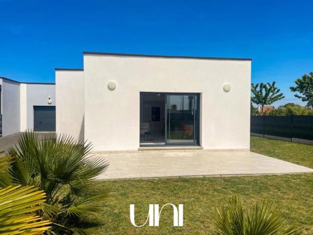 Maison 4 pièces de 112 m2 avec garage COLOMBY ANGUERNY