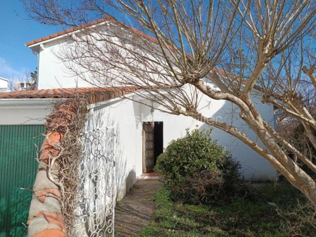 Projet familial idéal: maison de 107 m² avec jardin et garage, 4 chambres et fort potentiel