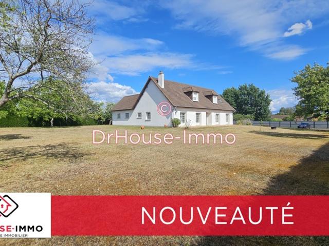 Maison 5 chambres avec garage et grand terrain constructible