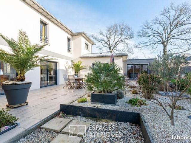 Maison 5 pièces 216 m²