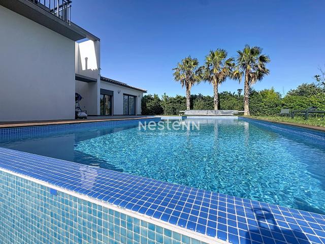 Maison 5 pièces 210 m²