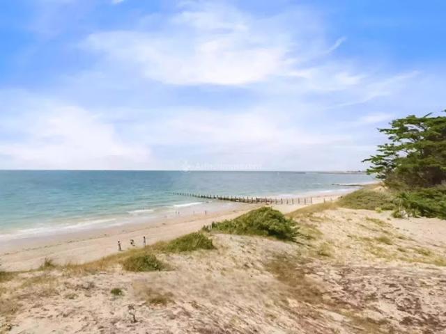 Maison en bord de mer avec jardin