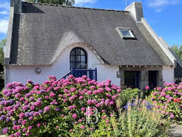 Maison en bord de mer avec jardin