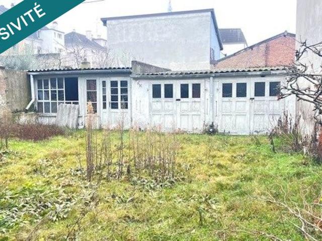Maison 78m² + Commerce 57m² + Terrain 307m² + Combles aménageables 50m² + 2 Parking garage