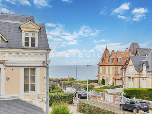Maison en bord de mer avec jardin