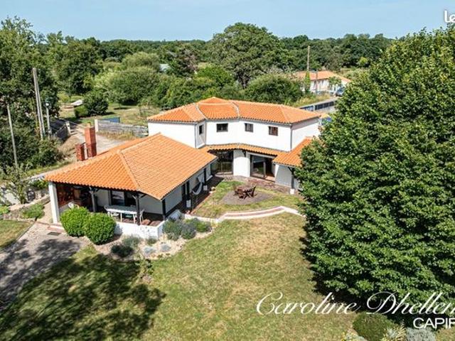 Maison 8 pièces 218 m²
