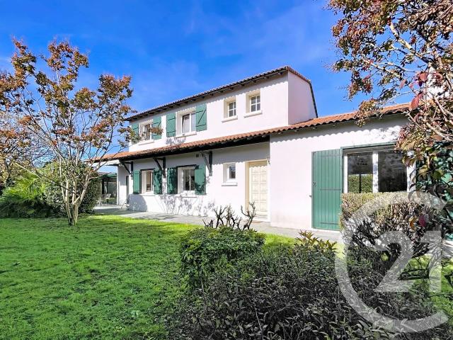 Maison 8 pièces 210 m²