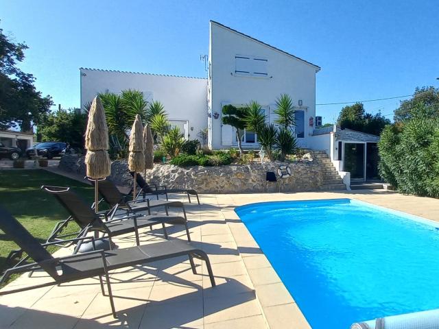 Maison 8 pièces 220 m²