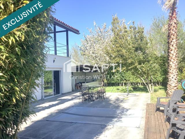 Maison 8 pièces 235 m²