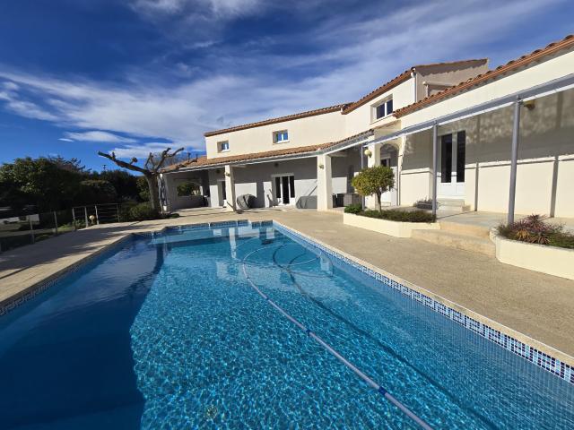 Maison 8 pièces 238 m²