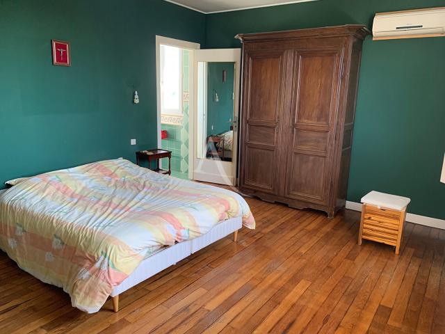 Maison 8 pièces 231 m²
