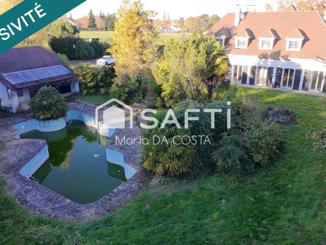 Maison 8 pièces 232 m²