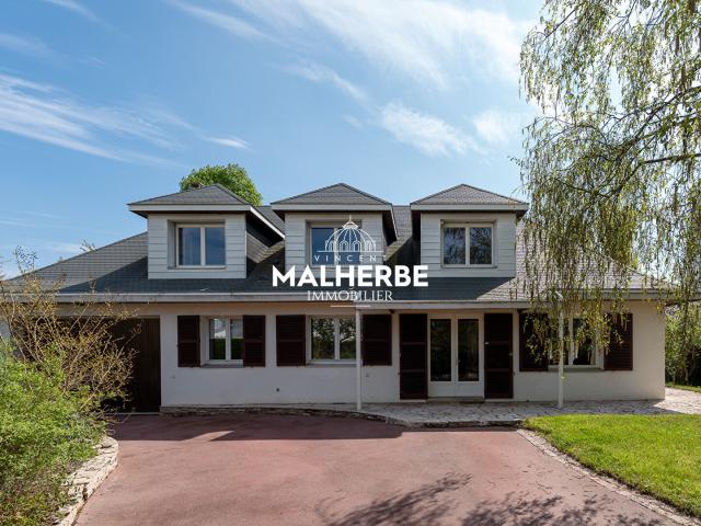 Maison 8 pièces 242 m²