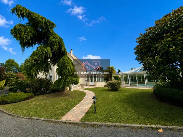 Maison 8 pièces 257 m²