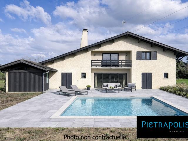 Maison 8 pièces 309 m²