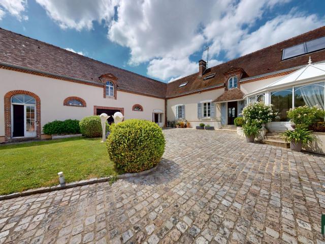 Maison 8 pièces 317 m²