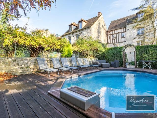 Maison 8 pièces 350 m²
