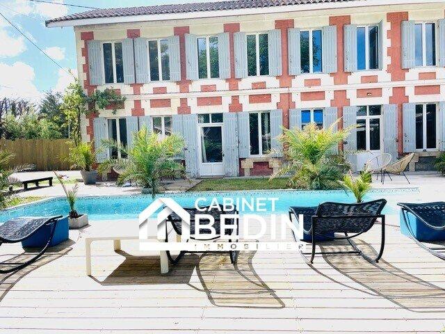 Maison 9 pièces 209 m²