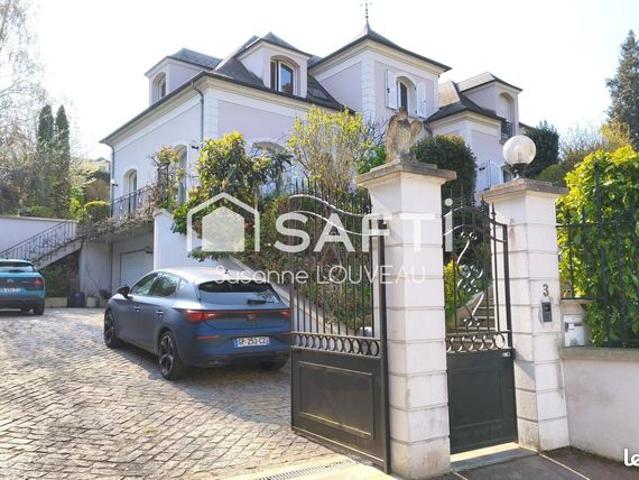 Maison 9 pièces 215 m²
