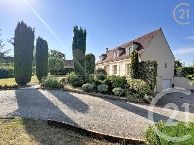 Maison 9 pièces 211 m²