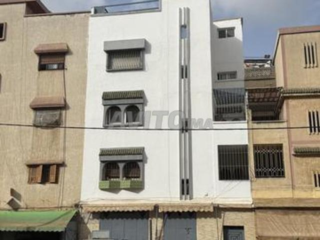 Maison commerciale 4 étages