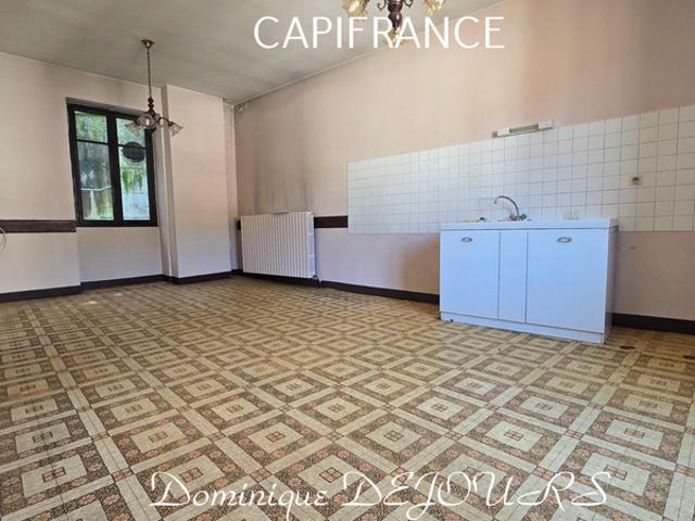 Maison composée de 2 appartements 57 et 43m² et d'un grand garage de 100m²