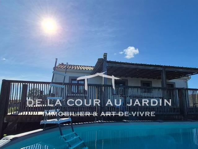 Maison contemporaine en rez de chaussée, bien situé