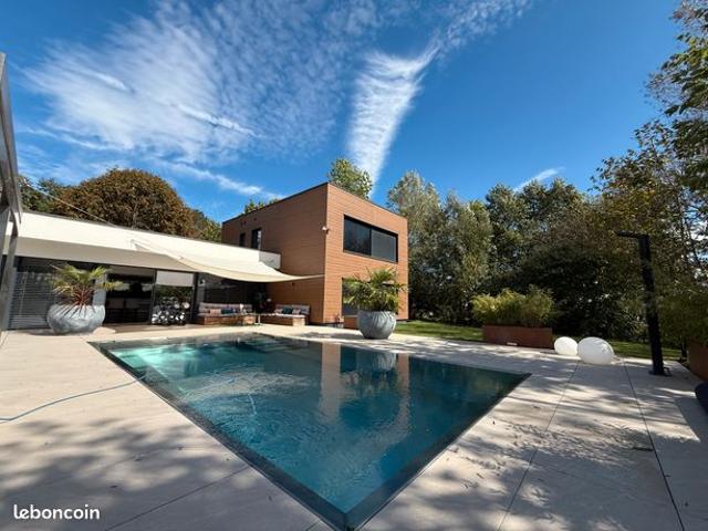 Maison contemporaine ossature bois 168 m2 piscine miroir terrain paysagé