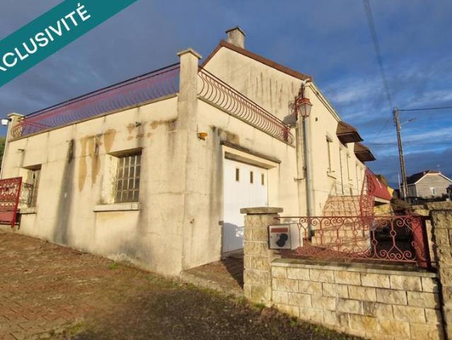 Maison 88 m² + grand terrain 950 m² + garages + revenus 2600¤/an