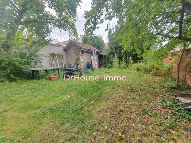MAISON / IMMEUBLE 3 APPARTEMENTS BOX ET JARDIN