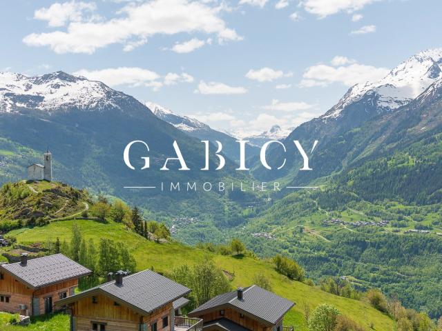 CHALET DE VILLAGE AVEC TERRAIN CONSTRUCTIBLE