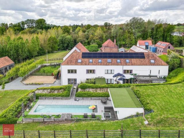 Maison à vendre avec 12 chambres à coucher