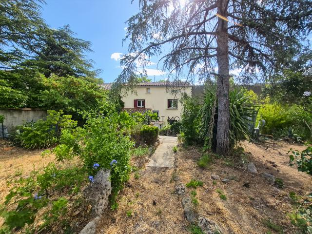 MAISON A ETAGE AVEC GRAND JARDIN