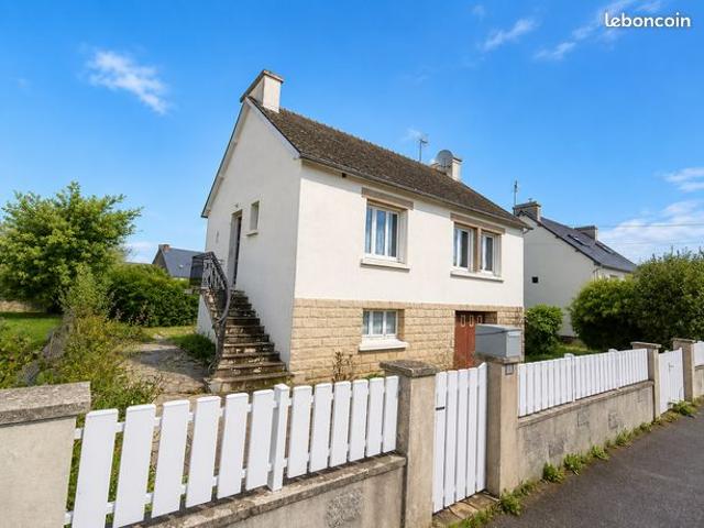 Maison à fort potentiel avec jardin clos et garage, proches commodités à pied