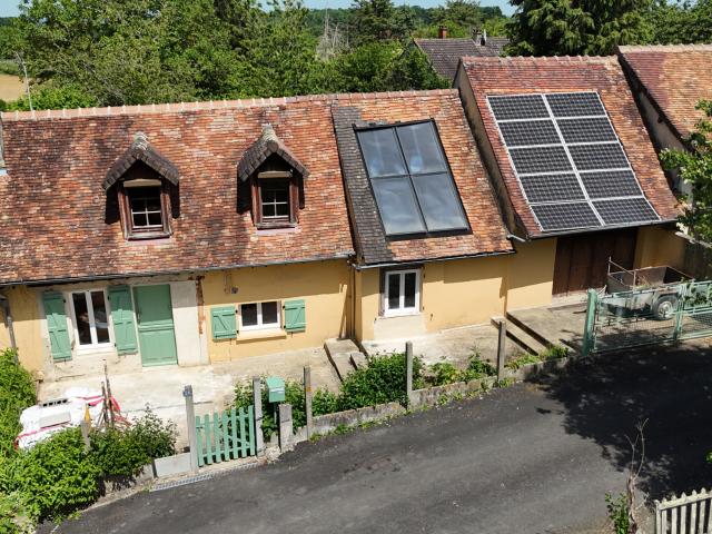 Maison à fort potentiel avec 3 garages