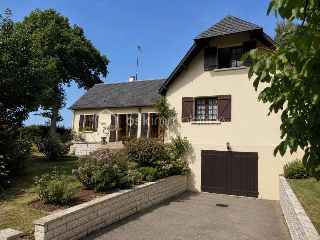 Maison à fort potentiel dans un environnement calme