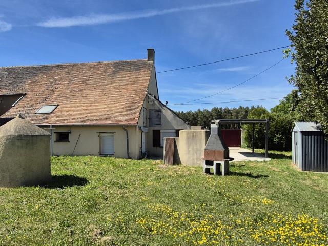 Maison à rafraichir avec beau potentiel