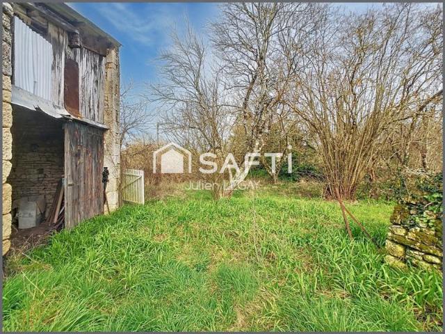 Maison à rénover avec beau potentiel