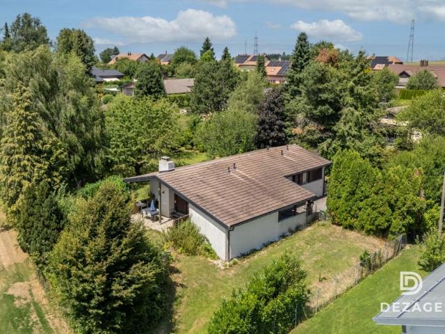 Maison à rénover avec potentiel d'agrandissement sur une vaste parcelle arborée !