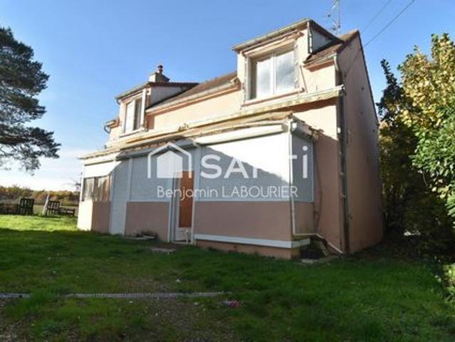 Maison à rénover avec terrain et potentiel