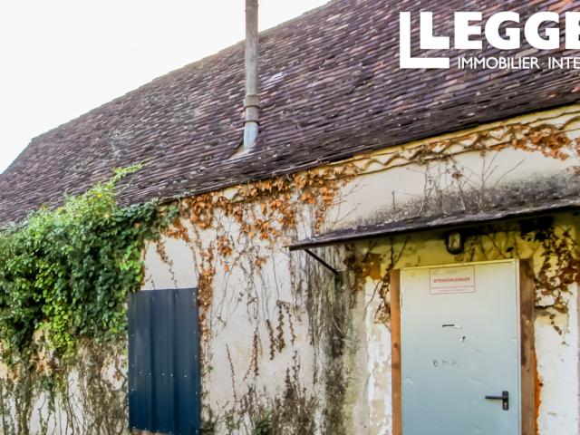 Maison à rénover avec un garage et jardin