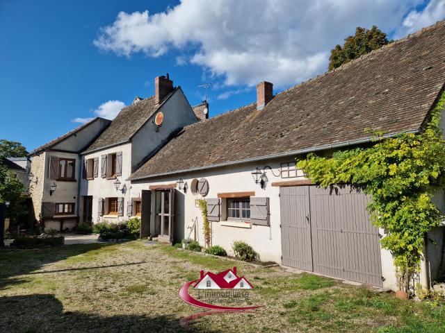 Maison ancienne avec garage