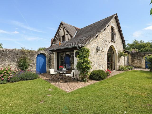 Maison ancienne rénovée avec jardin