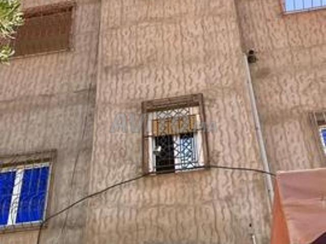 Maison au pôle urbain