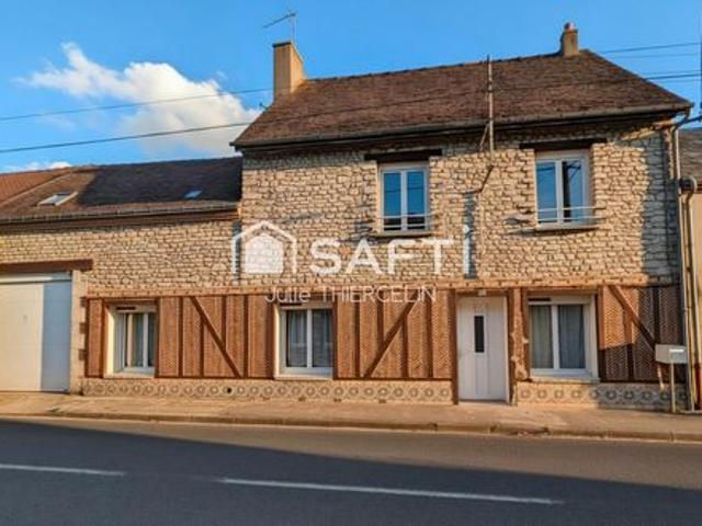 Maison avec 4 chambres et un garage